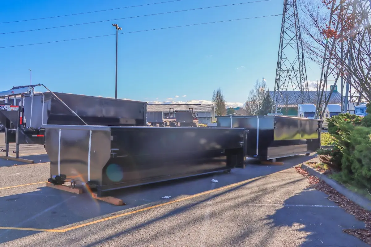 Roll-off dumpster ready for waste disposal at job site for Yard Waste Dumpster Rental in Goodlettsville